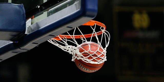 A basketball goes through the hoop during an NCAA Division I Women's Championship game on March 23, 2019, at Purcell Pavilion in Notre Dame, Indiana.