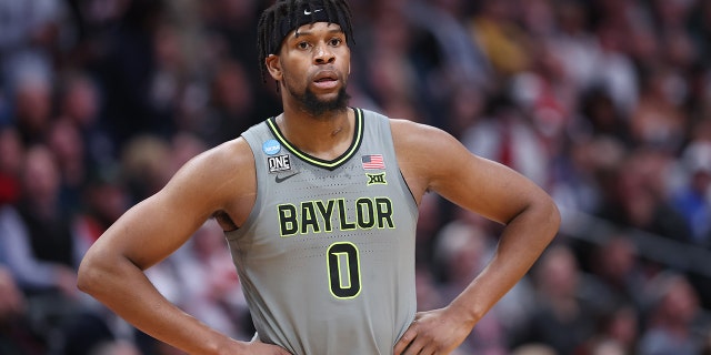Flo Thamba #0 of the Baylor Bears looks on during the second half against the Creighton Bluejays in the second round of the NCAA Men's Basketball Tournament at Ball Arena on March 19, 2023 in Denver, Colorado.