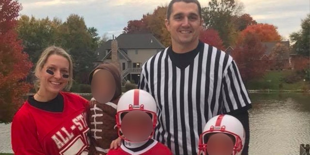 Becky Bliefnick and family in football uniforms