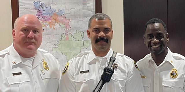 Lt. Ben Wootson (middle) is recognized for saving the life of a Seminole County Sheriff's deputy following a fiery collision. 