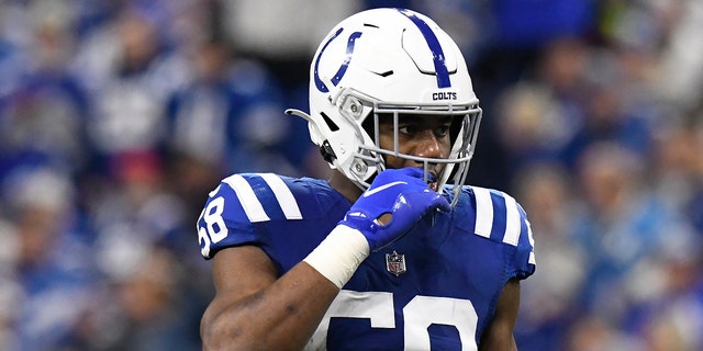 Indianapolis Colts linebacker Bobby Okereke (58) waits for play to resume during the NFL football game between the Los Angeles Chargers and the Indianapolis Colts on December 26, 2022, at Lucas Oil Stadium in Indianapolis, Indiana.
