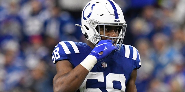 Indianapolis Colts linebacker Bobby Okereke (58) waits for play to resume during the NFL football game between the Los Angeles Chargers and the Indianapolis Colts on December 26, 2022, at Lucas Oil Stadium in Indianapolis, Indiana.