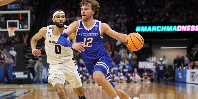 Max Rice #12 of the Boise State Broncos handles the ball during the second half of a game against the Northwestern Wildcats in the first round of the NCAA Men's Basketball Tournament at the Golden 1 Center on March 16, 2023 in Sacramento, California .