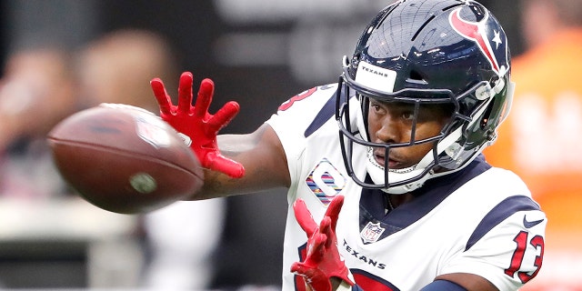Wide receiver Brandin Cooks of the Houston Texans warms up before a game against the Las Vegas Raiders at Allegiant Stadium Oct. 23, 2022, in Las Vegas.