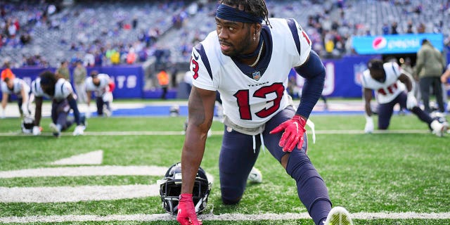 Brandin Cooks of the Houston Texans warms up against the New York Giants at MetLife Stadium on Nov. 13, 2022, in East Rutherford, New Jersey.