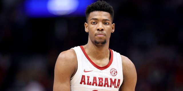 Brandon Miller, #24 of the Alabama Crimson Tide, looks on against the Texas A&M Aggies during the first half in the SEC Basketball Tournament Championship game at Bridgestone Arena on March 12, 2023 in Nashville, Tennessee.