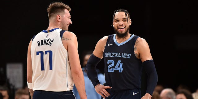 Luka Doncic (77) of the Dallas Mavericks and Dillon Brooks (24) of the Memphis Grizzlies during a game at FedEx Forum Dec. 8, 2021, in Memphis.