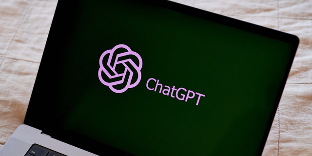 The ChatGPT logo is seen on laptops laid out in the Brooklyn borough of New York, Thursday, March 9, 2023. 