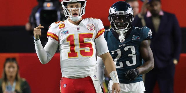 Patrick Mahomes, #15 of the Kansas City Chiefs, reacts after a play against CJ Gardner-Johnson, #23 of the Philadelphia Eagles, during the fourth quarter of Super Bowl LVII at State Farm Stadium on February 12, 2023 in Glendale , Arizona .