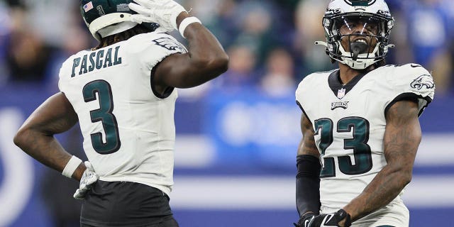 Zach Pascal #3 of the Philadelphia Eagles and C.J. Gardner-Johnson #23 of the Philadelphia Eagles celebrate after a fourth down stop during the fourth quarter against the Indianapolis Colts at Lucas Oil Stadium on November 20, 2022 in Indianapolis, Indiana.