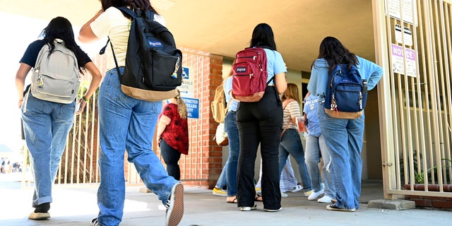 Students attend Mayfair High School on the first day of the fall semester in Lakewood, Calif., August 11, 2022.