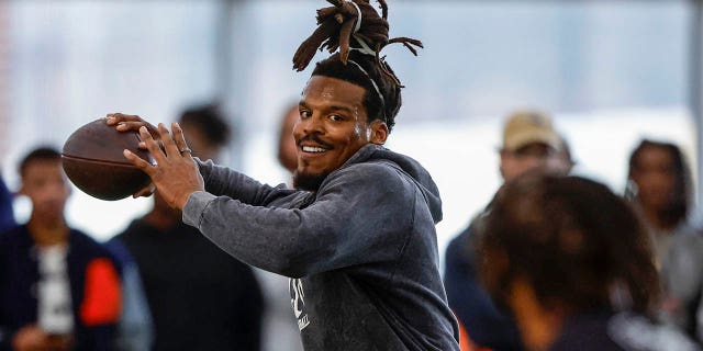 Cam Newton, throws a pass during Auburn pro day, Tuesday, March 21, 2023, in Auburn, Alabama.