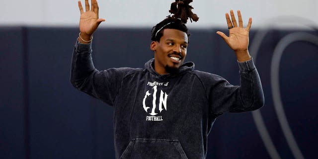 Cam Newton, warms up during Auburn pro day, Tuesday, March 21, 2023, in Alabama.