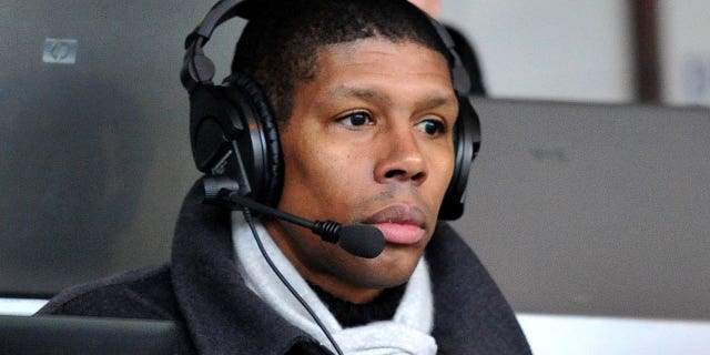 Carlton Palmer working for the radio commentating on the game.