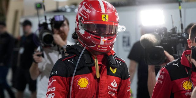 Ferrari driver Charles Leclerc returns to the pit lane after his car stalled during the Bahrain Formula One Grand Prix, Sunday, March 5, 2023.