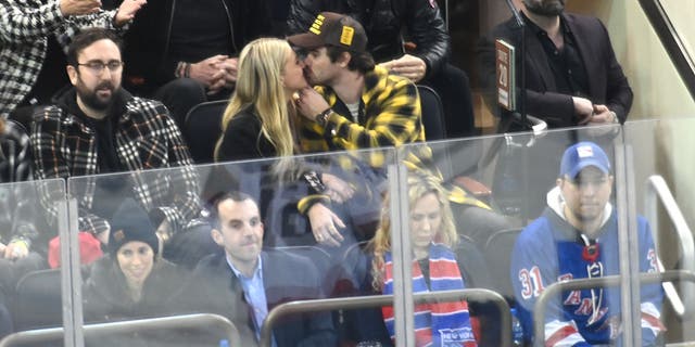 Kelsea Ballerini and Chase Stokes share a kiss during a date night in New York City.