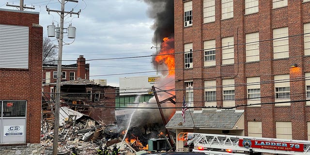 Firefighters at the site of an explosion at a chocolate factory working to put out the fire in West Reading, Pa.