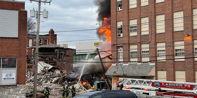 Firefighters at the site of an explosion at a chocolate factory working to put out the fire in West Reading, Pa.