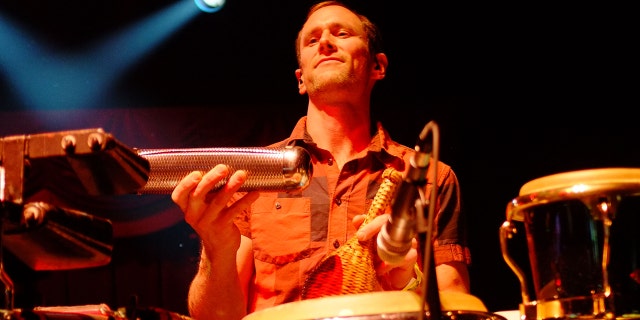 Morris, 47, played drums and percussion in the band Lotus. The band announced it will perform several upcoming benefit concerts for the Morris family.