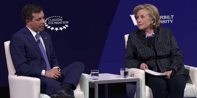 Transportation Secretary Pete Buttigieg and former Secretary of State Hillary Clinton speak on stage during the Clinton Global Initiative University's 2023 annual meeting at Vanderbilt University in Nashville, Tennessee.