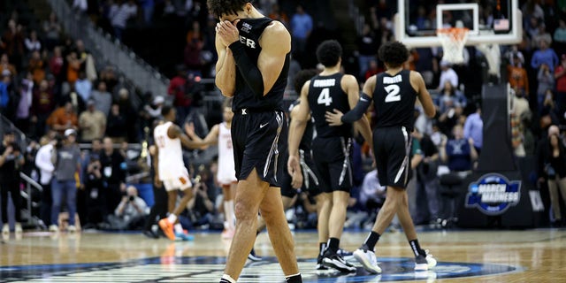 Colby Jones, #3 of the Xavier Musketeers, reacts to the scoreboard during the second half against the Texas Longhorns in the Sweet 16 round of the NCAA Men's Basketball Tournament at T-Mobile Center on March 24, 2023 in Kansas City, Missouri.