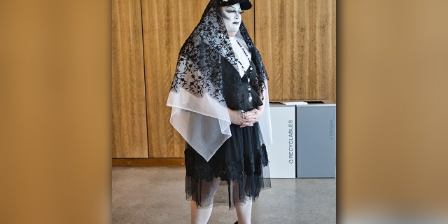 A drag queen activist is shown at the Fayetteville Public Library in Fayetteville, Arkansas, on March 17, presumably to protest Kirk Cameron's book reading for families and kids. "I felt sad for the men in skirts," said Cameron to Fox News Digital.