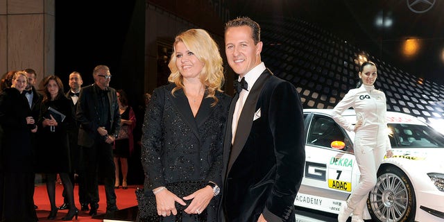 Corinna and Michael Schumacher attend an event