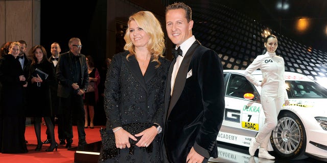 Corinna and Michael Schumacher attend the 2010 GQ Men Of The Year award ceremony at Komische Oper on October 29, 2010 in Berlin.