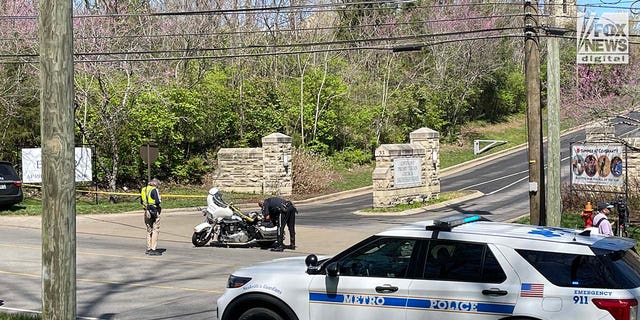 Police cordoned off the entrance to Covenant School in Nashville, Tennessee on Monday following a mass shooting.