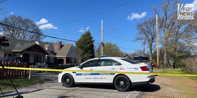Police cordon off the neighborhood of the Covenant School shooter in Nashville, Tennessee, on Monday, March 27, 2023.