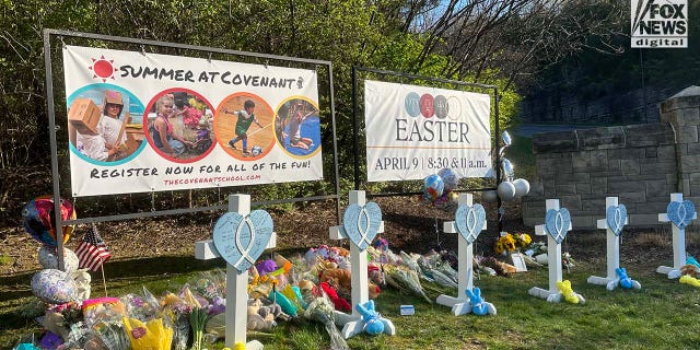 Memorials for the six victims who were killed in a mass shooting are placed outside of The Covenant School in Nashville, Tennessee, on Tuesday, March 28, 2023. Three adults and three children were killed inside the school.