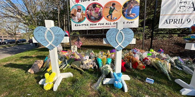 Memorials for the six victims who were killed in a mass shooting are placed outside the Covenant School in Nashville, Tennessee, on March 28, 2023.