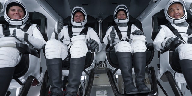 The SpaceX Crew-5 members are seated inside the Dragon Endurance crew ship atop the Falcon 9 rocket before launching to the International Space Station from the Kennedy Space Center's Launch Pad 39A in Florida. From left are, Mission Specialist Anna Kikina from Roscosmos; Pilot Josh Cassada and Commander Nicole Mann, both NASA astronauts; and Mission Specialist Koichi Wakata from the Japan Aerospace Exploration Agency (JAXA).