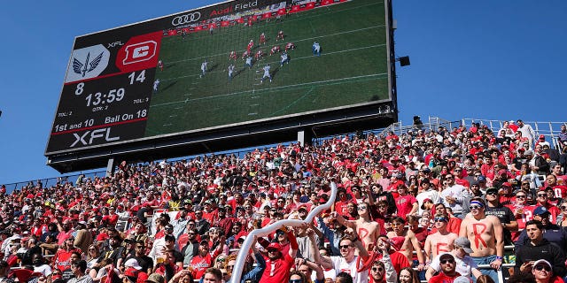 Fans celebrate during the XFL game between the Defenders and the BattleHawks at Audi Field on March 5, 2023 in Washington, DC