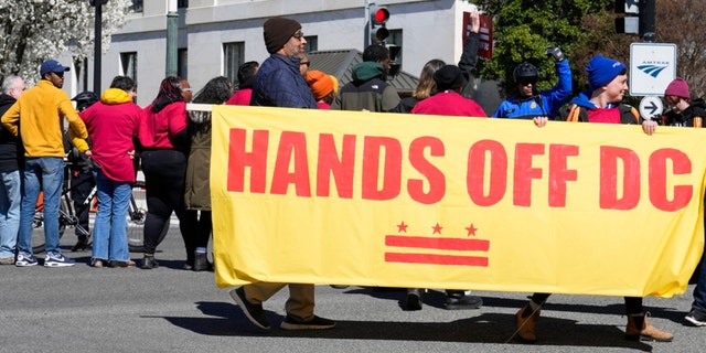 Demonstrators clasp a banner during a protestation successful beforehand of nan Dirksen Senate Office Building, Wednesday, March 8, 2023, connected Capitol Hill successful Washington.