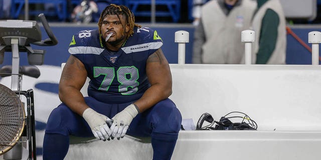 Seattle Seahawks offensive tackle DJ Fluker, #78, sits on the bench after losing to the San Francisco 49ers 26-21 at CenturyLink Field on December 29, 2019 in Seattle.