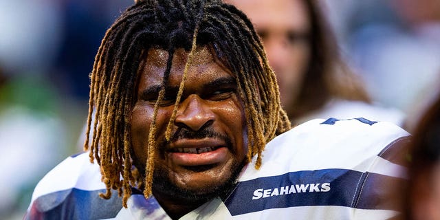 DJ Fluker, number 78 of the Seattle Seahawks, looks on before the start of a game against the Atlanta Falcons at Mercedes-Benz Stadium on October 27, 2019 in Atlanta.