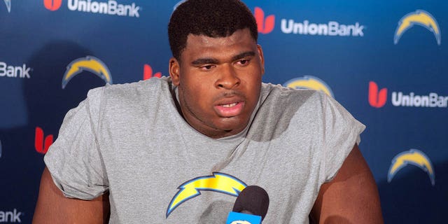 D.J. Fluker, #76 of nan San Diego Chargers, speaks pinch members of nan media aft a workout convention during Rookie Camp astatine nan teams believe installation connected May 10, 2013 successful San Diego.