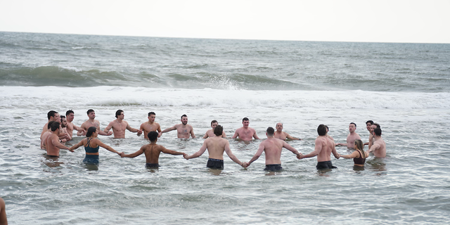 Hof said facing the cold as a group triggers pre-historic togetherness, as demonstrated by cold plunge group Sunday Swim on Long Island, New York.