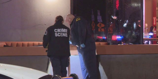 Investigators respond to a shooting at a nightclub in Dallas.