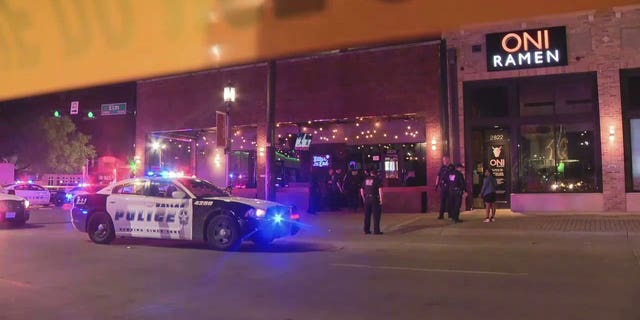 Police respond to a shooting outside a nightclub in Dallas.