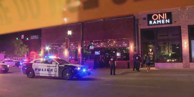 Police respond to a shooting outside a nightclub in Dallas.