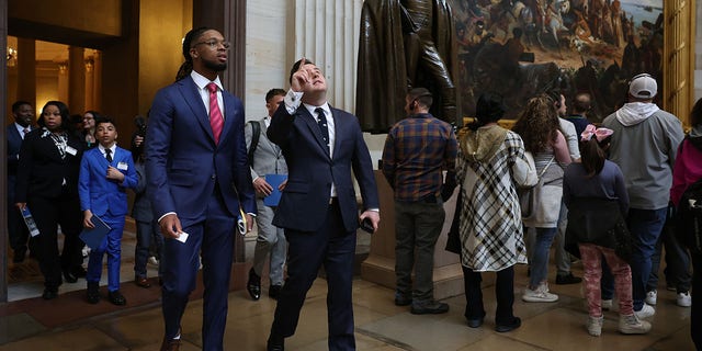 Buffalo Bills security Damar Hamlin walks through the US Capitol before an event with lawmakers to introduce the AED Access Act on March 29, 2023, in Washington, DC