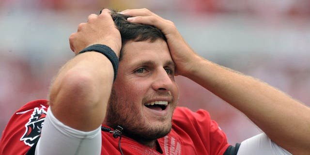Quarterback Dan Orlovsky, #6 of the Tampa Bay Buccaneers, reacts to a penalty call against the San Francisco 49ers on December 15, 2013 at Raymond James Stadium in Tampa, Florida.