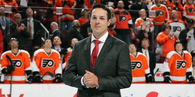 Former Philadelphia Flyer and Buffalo Sabre Daniel Briere looks on during a pre-game ceremony honoring his retirement from the NHL on October 27, 2015 at the Wells Fargo Center in Philadelphia, Pennsylvania.