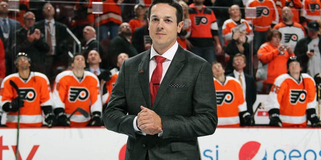 Former Philadelphia Flyer and Buffalo Saber Daniel Briere looks on during a pregame ceremony honoring his retirement from the NHL on October 27, 2015 at the Wells Fargo Center in Philadelphia.