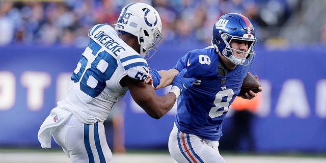Daniel Jones #8 of the New York Giants faces Bobby Okerek #58 of the Indianapolis Colts at MetLife Stadium on January 01, 2023 in East Rutherford, New Jersey.  The Giants defeated the Colts 38-10.