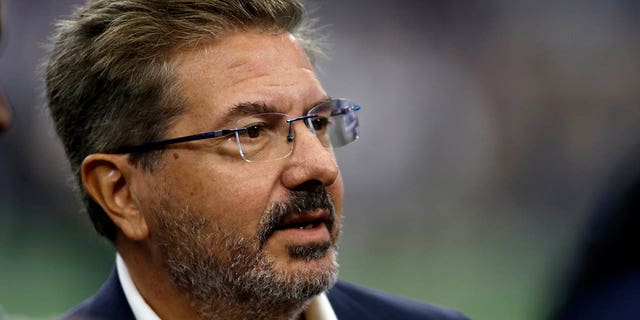 Washington Commanders owner Dan Snyder on the field before the game against the Dallas Cowboys at AT&T Stadium in Arlington, Texas, Oct. 2, 2022.