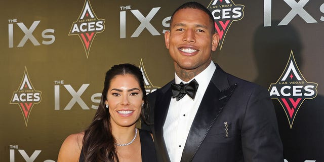 WNBA player Kelsey Plum (L) of the Las Vegas Aces and tight end Darren Waller of the Las Vegas Raiders attend the inaugural IX Awards at Allegiant Stadium on June 17, 2022 in Las Vegas, Nevada. 