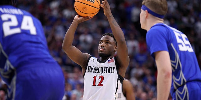 March 26, 2023;  Louisville, KY, USA;  San Diego State Aztecs guard Darrion Trammell (12) takes a free throw during the second half against the Creighton Bluejays in the NCAA Tournament South Regional-Creighton vs San Diego State at KFC YUM!  Center.